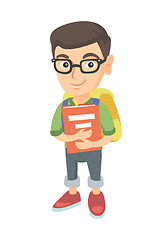 Image showing Caucasian schoolboy with backpack and textbook.