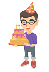 Image showing Caucasian child holding birthday cake with candles