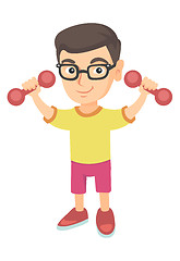 Image showing Little smiling caucasian boy holding dumbbells.