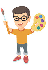 Image showing Happy boy drawing with colorful paints and brush.