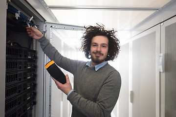 Image showing technician using digital cable analyzer