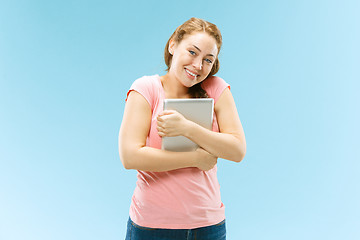 Image showing Businesswoman hugging laptop. Love to computer concept.