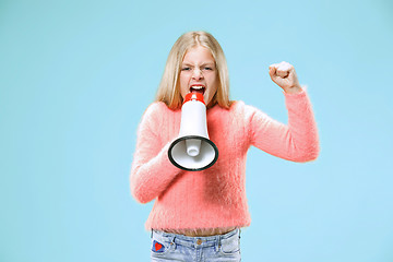 Image showing The little girl making announcement with megaphone