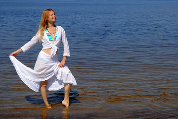 Image showing Pretty girl dancing in water