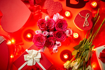 Image showing Valentines day romantic decoration with roses, boxed gifts, candles