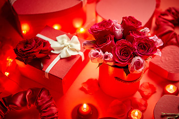 Image showing Valentines day romantic decoration with roses, boxed gifts, candles