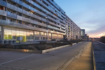 Image showing Urban building blocks reflecting sunset light