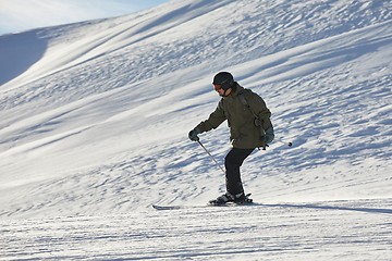 Image showing Skiing in the winter snowy slopes