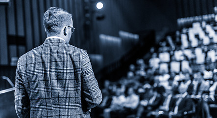 Image showing Public speaker giving talk at Business Event.