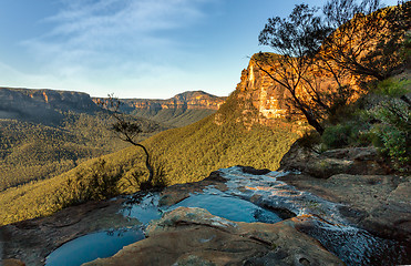 Image showing Views at the end of the canyon where the creek falls over the cl