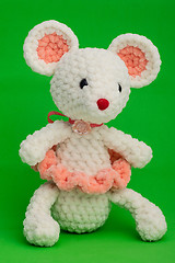 Image showing Knitted toy mouse on a green background