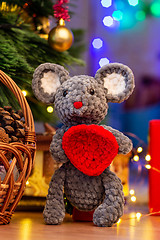 Image showing Knitted toy mouse under the Christmas tree