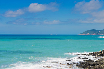 Image showing Beautiful cerulean sea and the rocky beach