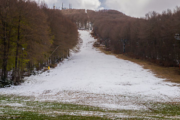 Image showing Ski slope with little snow
