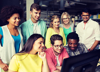 Image showing international students with computers at library