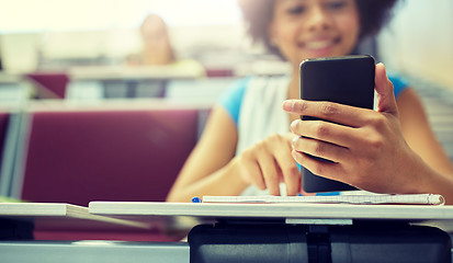 Image showing close up of african student with smartphone