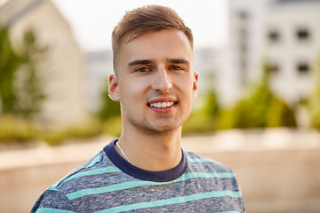 Image showing portrait of young man in summer city