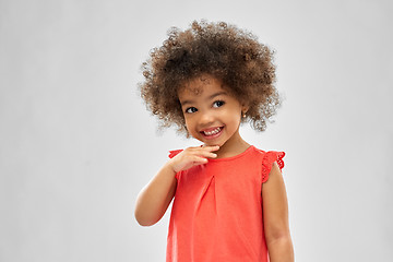 Image showing happy little african american girl over grey