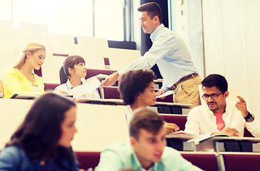 Image showing teacher giving test to students on lecture