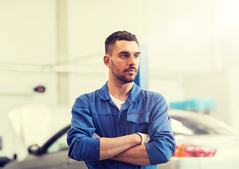 Image showing auto mechanic man or smith at car workshop