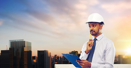 Image showing architect or businessman in helmet with clipboard