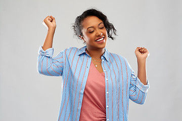 Image showing happy african american woman celebrating success