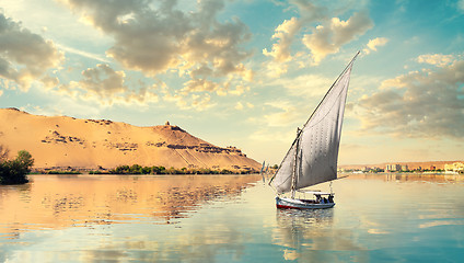 Image showing Clouds and sailboat