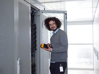 Image showing technician using digital cable analyzer