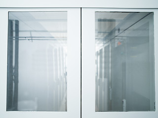 Image showing modern server room with white servers