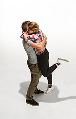 Image showing Full body portrait of hugging couple with smile. Caucasian models in love