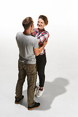 Image showing Full body portrait of hugging couple with smile. Caucasian models in love