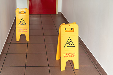 Image showing Two Caution Signs