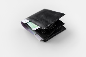 Image showing close up of black wallet with euro money