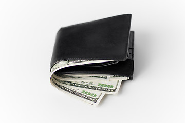 Image showing close up of black wallet with dollar money