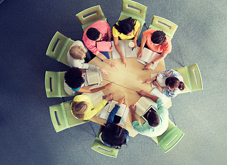 Image showing group of international students pointing finger