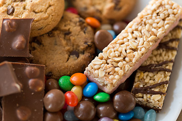 Image showing chocolate, cookies, candies and muesli bars