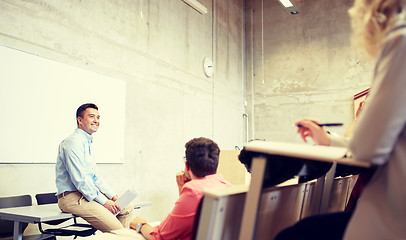 Image showing group of students and teacher at lecture