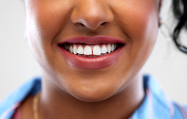 Image showing close up of african american woman white teeth