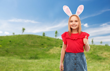 Image showing girl wearing easter bunny ears showing thumbs up