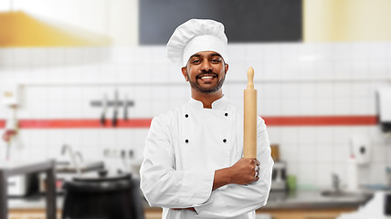 Image showing baker with rolling-pin at restaurant kitchen