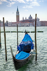 Image showing Italian gondola parking on the water in Venice, Italia.