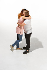 Image showing Full body portrait of hugging couple with smile. Caucasian models in love