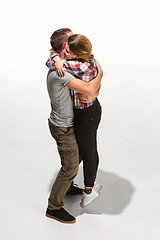 Image showing Full body portrait of hugging couple with smile. Caucasian models in love