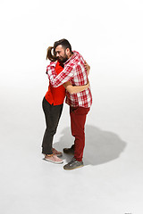 Image showing Full body portrait of hugging couple with smile. Caucasian models in love