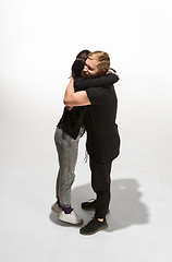 Image showing Full body portrait of hugging couple with smile. Caucasian models in love