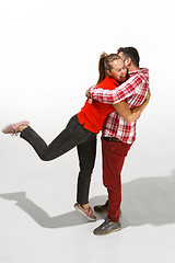 Image showing Full body portrait of hugging couple with smile. Caucasian models in love