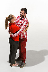 Image showing Full body portrait of hugging couple with smile. Caucasian models in love