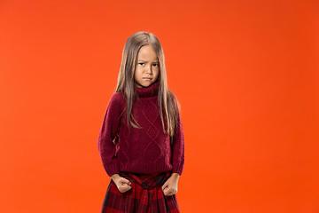 Image showing Portrait of angry teen girl on studio background