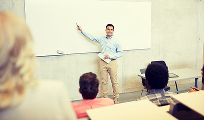 Image showing group of students and teacher at lecture