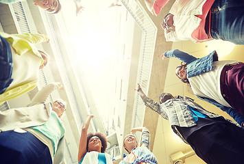 Image showing group of international students with hands up